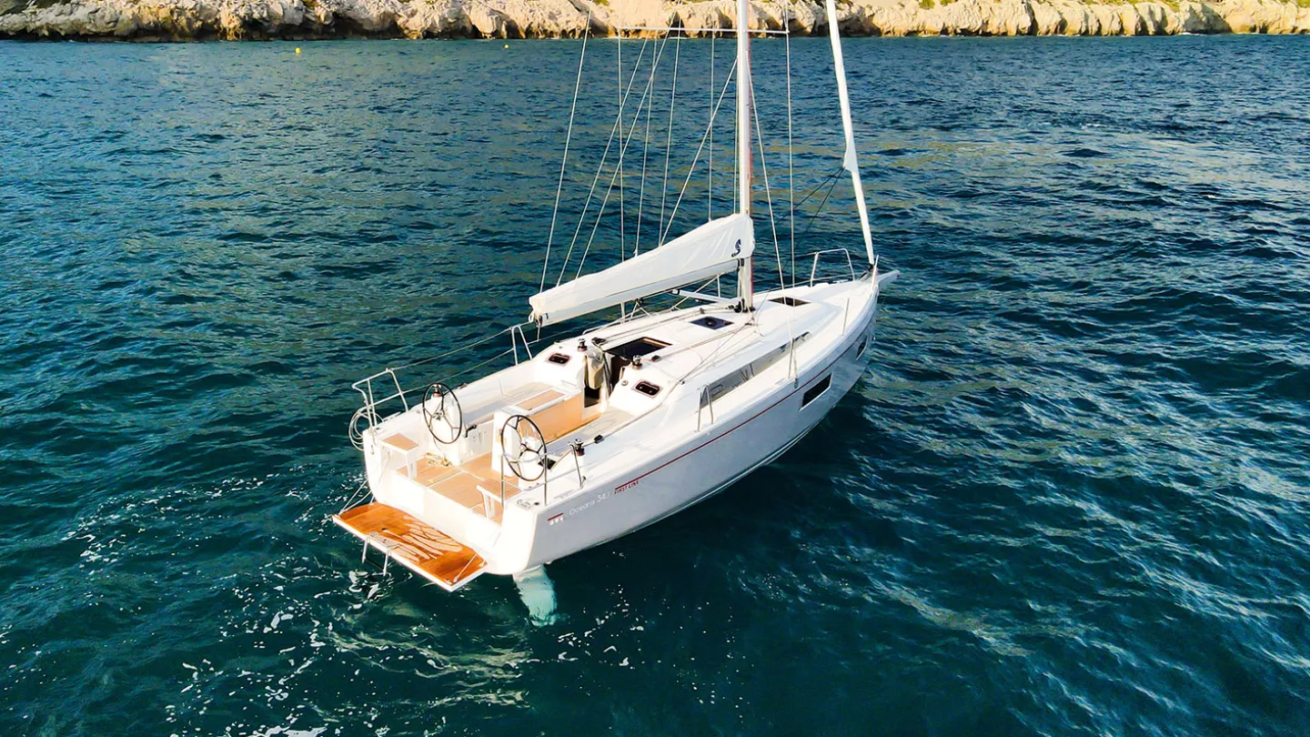 Beneteau Oceanis 34, a sailboat cruiser sitting at an anchorage